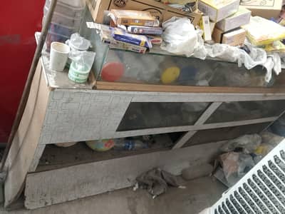 glass wood cabinet and general store in normal condition