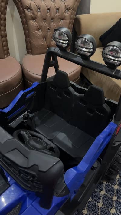 Baby electric car with charger condition 10/10 2 person sitting