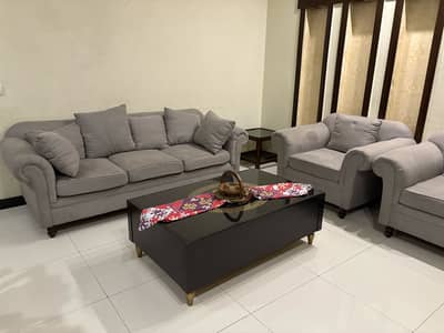 3+1+1 sofa set along with center table