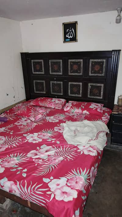 wooden bed in good condition king size