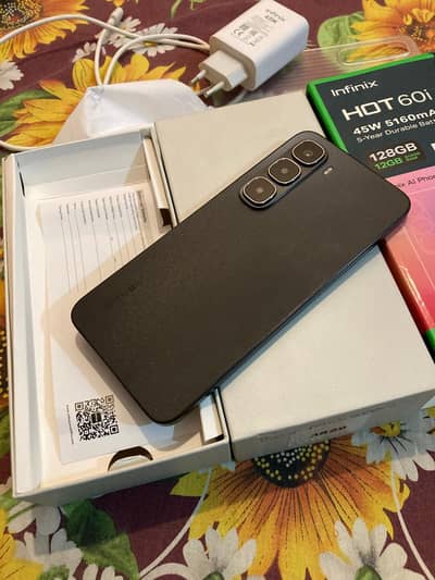 Infinix hot 60i all ok with box and charger 6/128. GB