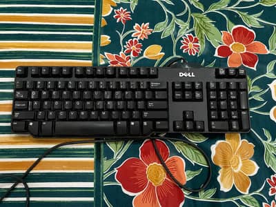 Dell keyboard with free hand gripper