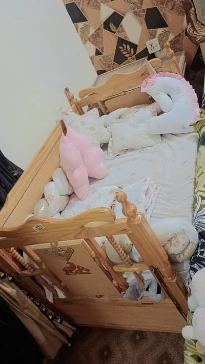 Baby cot with swing