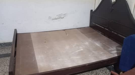 Woden bed in a good condition available,