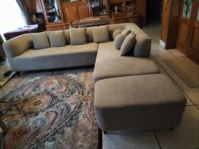 Almost new L shaped sofa