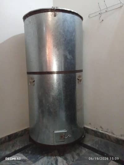 Metal wheat storage drum with stand