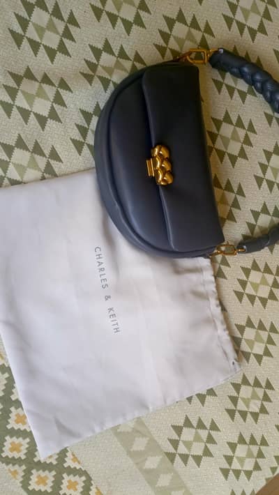 Original Charles and Keith bag with braided handle