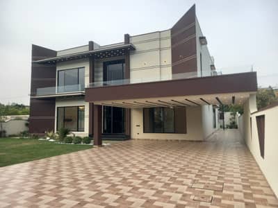 2 KANAL 12 MARLA NEW DESIGNER HOUSE WITH SWIMING POOL AND MOVIE CINEMA