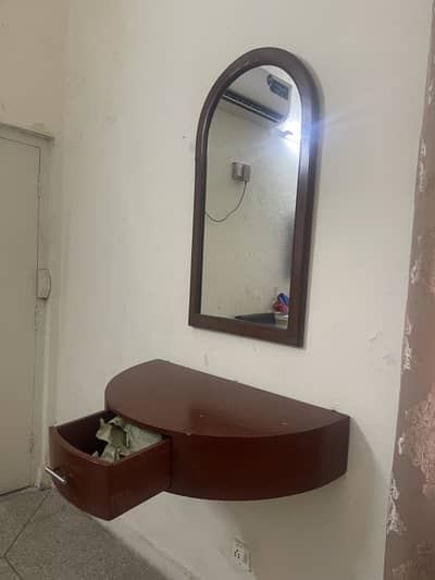 Wall mounted dressing with mirror