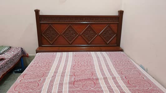 pure wooden bed with mattress