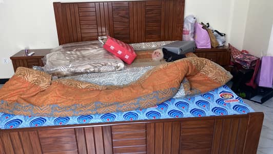 Bed with side tables