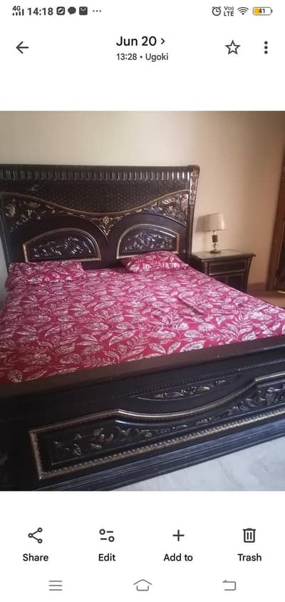 bed with sidetables and dressing
