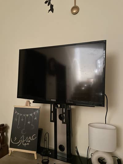 Sony 32 inch LED TV along with Mounting table