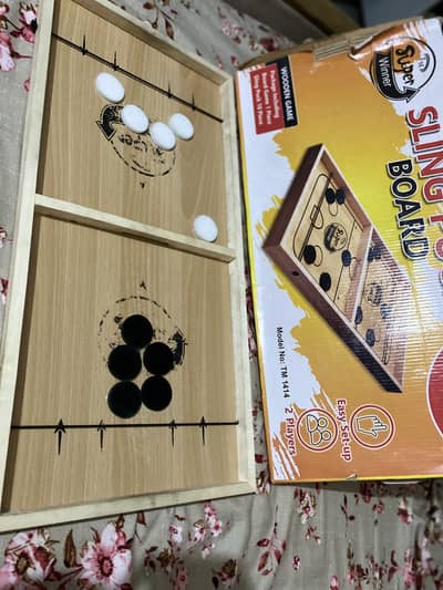 Sling puck board with box and 10pcs