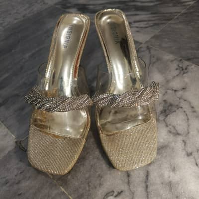 Insignia heel for sale