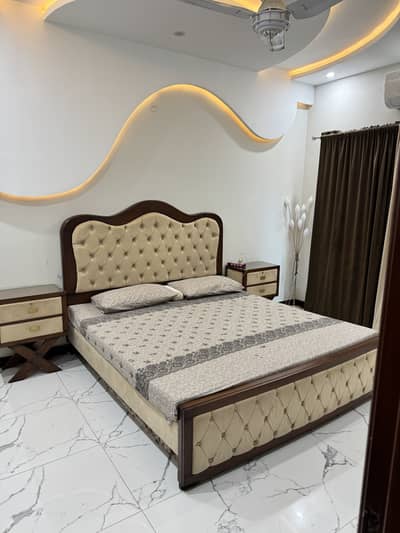 Wooden Bed with side tables and dressing table