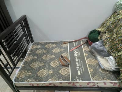selling single iron bed