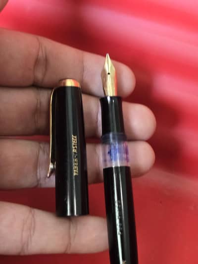 vintage Osmia piston-fill fountain pen.