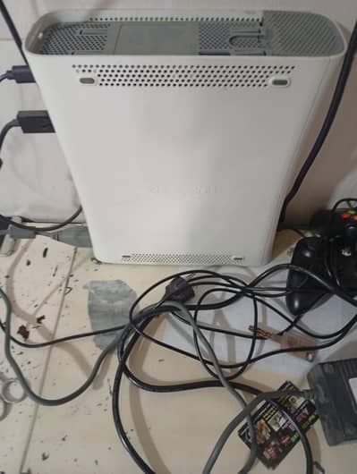 Xbox 360 320 gp 69 games with two controllers 03134497213 what's app