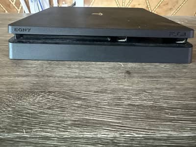 PS4 Slim 500GB (Original) - Mint Condition, slightly used