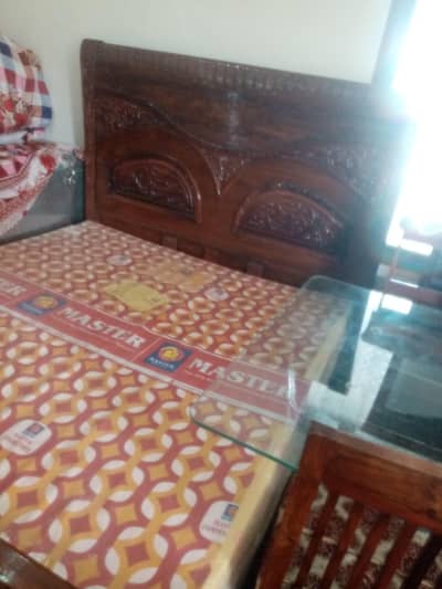 Double bed for sale +(master mattress +2 side tables)