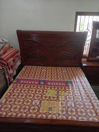 Double bed for sale +(master mattress +2 side tables)