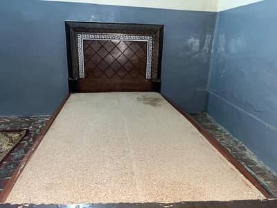 wooden single bed