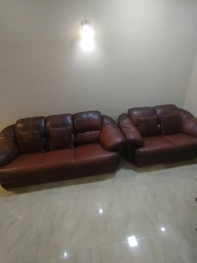 sofa set , one three sitter and 2 two sitters