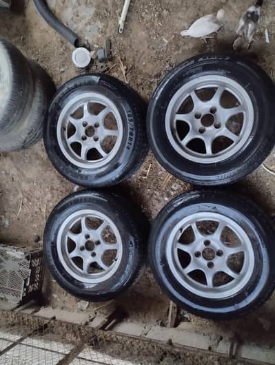 14 inches Alloy Rims Pcd 100 4 nuts with tubeless tyres . . .