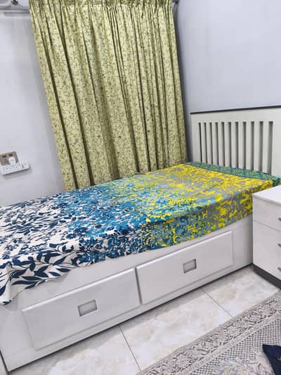 TWO SINGLE BEDS WITH MATTRESSES AND SIDE TABLES
