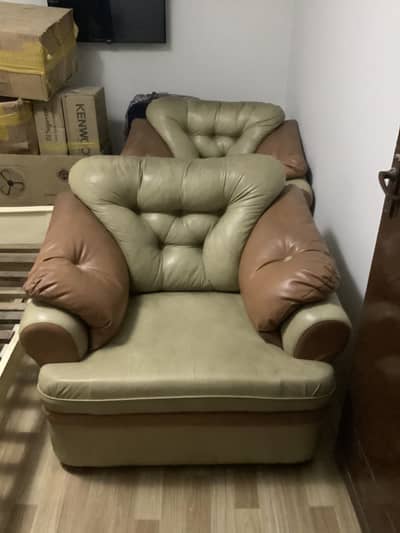 Used sofa but condition like a new urgent sell strong wood sofa