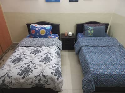 2 Single Adult Size Beds – Excellent Condition with free side table