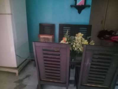 Wooden Dining table with glass top for sale