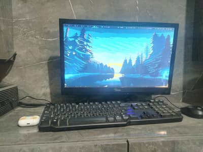 full desktop setup with monster keyboard mouse included