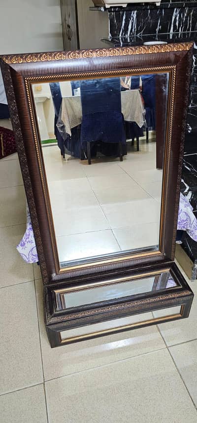 Wooden mirror with drawer attached