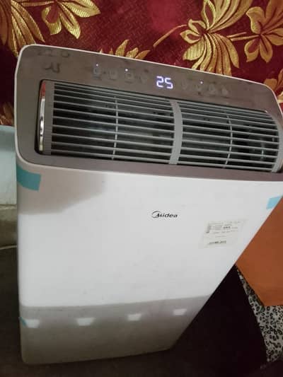 midea portabel 1.3 ton fresh ac