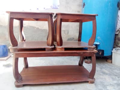 Set of three wooden tables