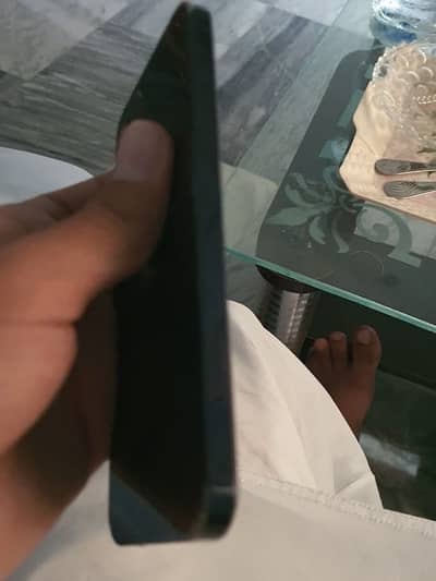 iPhone 12 black with blue shed