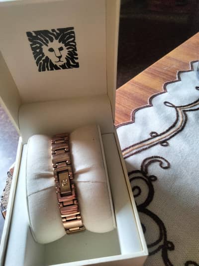 golden stainless steel watch