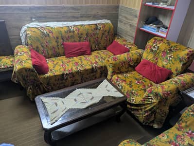 wooden sofas with table