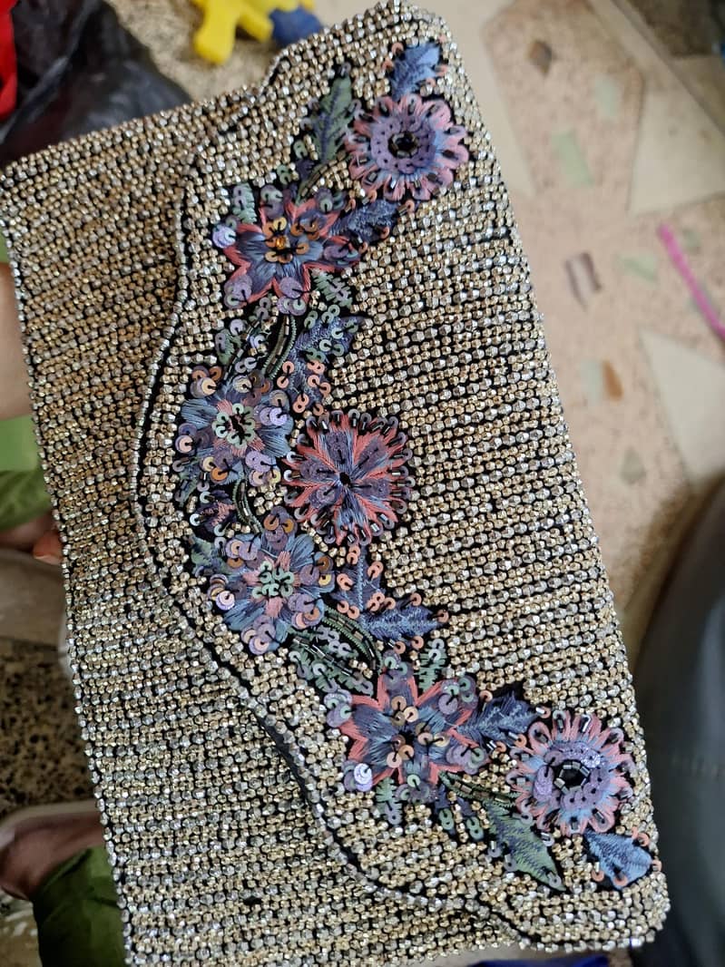 fancy handbag. 0