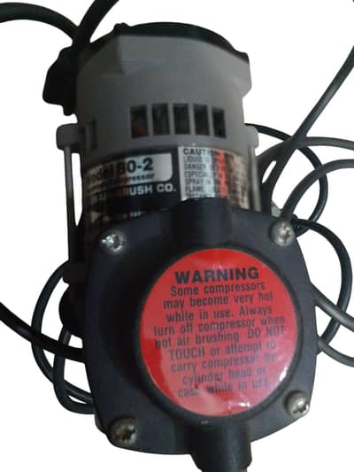 Electric piston airbrush compressor for craft work