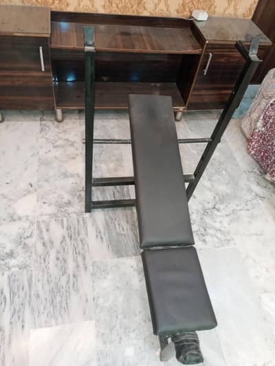 gym equipment with barbell and plates