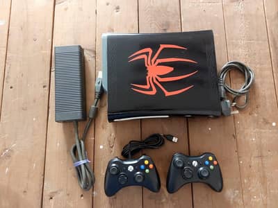 Xbox 360 with 220 games installed.