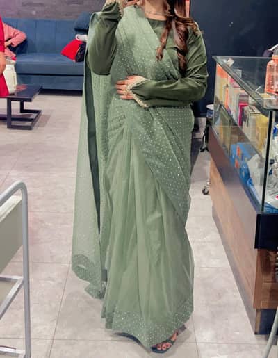 rimestone saree with vevet kurti with full flyer of paluu