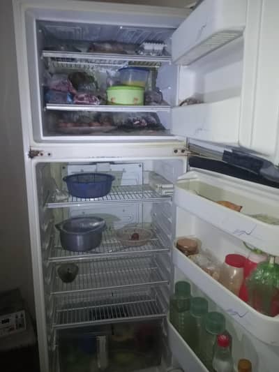 running condition big size fridge for urgent sale
