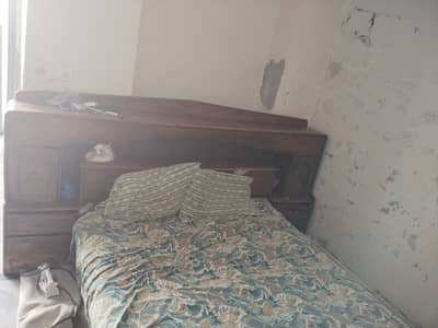 Old wooden bed dressing etc video or pic on demand