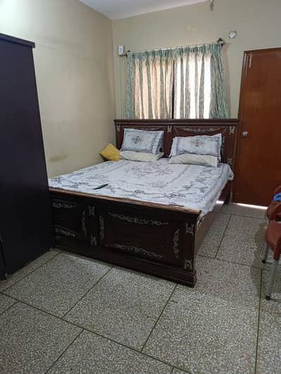 Bed, mattress, 2 side table, dressing table & cupboard.