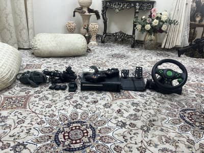 Xbox360( j tagged) for sale with steering wheel 3 controllers ,kinect