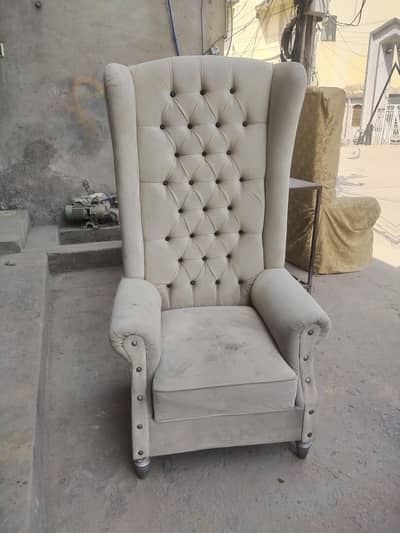 2 high back chair sat centre table
